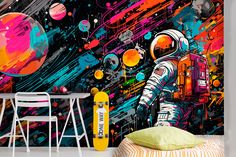 an astronaut in outer space with colorful paint splattered on the wall