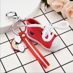 Mini Sneaker Key/Purse Charm This Super Cute Sneaker Says, “I Love You.” Everybody Loves Cute Baby Shoes! This Is Like A Baby Sneaker That Can Be Used For Your Keys, Your Purse, Or Your Rear-View! No Offers On This Please. This Is The Price For This Item. I Appreciate You Spending Time With Me! Tags: Jewelry Accessories Earrings Bracelets Rings Bling Cute Whimsical, Michael Kors, Lucky, Kate Spade, Dooney Bourke, Coach, Tory Burch Red Tory Burch Sneakers, Key Purse, Jewelry Accessories Earrings, Shoes Pattern, Unique Keychains, Cute Sneakers, Functional Fashion, Shoe Pattern