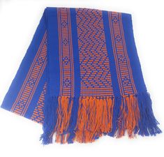 an orange and blue scarf on a white background