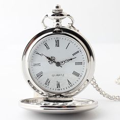 Keep track of every minute of your time with this Silver Pocket Watch. It has an exquisite silver case with a Roman numeral hour marker and pushed button located at the top, making it easier to read and adjust the time. Definitely the perfect gift for both men and women. Removable chain Silver-tone Alloy material Silver Stainless Steel Pocket Watch As Gift, Silver Pocket Watch Metal Dial Gift, Silver Pocket Watch With Metal Dial As Gift, Silver Pocket Watch With Metal Dial For Gift, Classic Pocket Watch With Stopwatch Feature, Classic Pocket Watch With Stopwatch Feature As Gift, Classic Pocket Watch With Stopwatch As Gift, Silver Stainless Steel Pocket Watch, Silver Watch Accessories With Round Dial For Gift