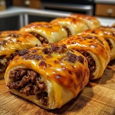 some tasty looking pastries sitting on a cutting board