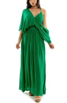 Flowy and chic, this maxi dress features a flattering smocked waist and split hem. 63" length (size Medium) V-neck Elbow-length sleeves Lined 100% rayon Dry clean Imported Ruched Chiffon Maxi Dress, Green V-neck Maxi Dress With Smocked Back, Chic Maxi Dress With Smocked Back And Flowy Skirt, Versatile Solid Color Maxi Dress For Summer, Stretch Ruched Maxi Dress, Casual Flowy Ruched Maxi Dress, Casual Flowy Maxi Dress With Elastic Waistband, Green Maxi Dress With Elastic Waistband, Solid Flowy Maxi Dress