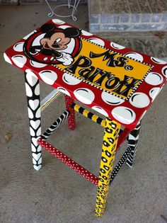 a mickey mouse stool painted with polka dots