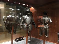 some armor on display in a glass case