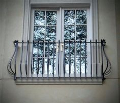 an open window with bars on the outside