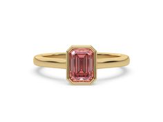 a pink tourmaline stone ring in yellow gold