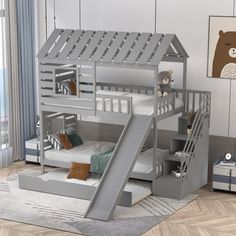 a child's bedroom with a bunk bed and slide