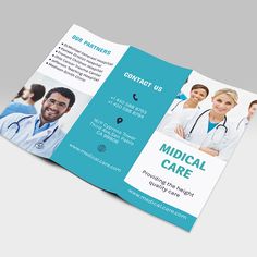 an open medical brochure with doctors on the front and back pages in blue