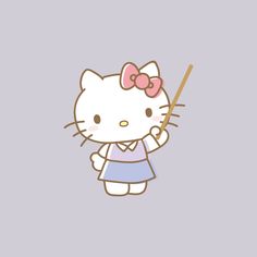 hello kitty holding a wand in her hand