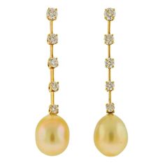 18k yellow gold South Sea Pearl drop earrings by Assael, set with approx 1.26 ctw of VS G diamonds. Brand new without tags, comes with Assael pouch. Retail - $7500 DESIGNER: Assael MATERIAL: 18k Gold GEMSTONE: Diamonds, South Sea Pearls DIMENSIONS: Earrings are 45mm. Pearls - 10.5mm x 13.5mm MARKED/TESTED: 750, Assael WEIGHT: 8.1 grams CONDITION: New Conch Pearl, Golden South Sea Pearls, Long Drop Earrings, Sea Pearl, Real Pearls, Royal Jewelry, South Seas, South Sea Pearls, Sea Pearls