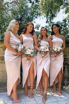 the bridesmaids are all wearing different styles of dresses