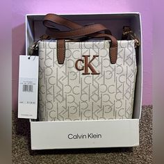 Brand New Small Calvin Klein Purse , Cream Color. Comes With 1 Additional Pocket On The Inside And One On The Outside. White Rectangular Calvin Klein Bag, Shopping Vision Board, Calvin Klein Purse, Beige Purse, Beige Purses, Calvin Klein Bags, Calvin Klein Bag, Womens Calvin Klein, Cream Color