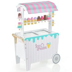 a toy ice cream cart with wheels on white background