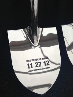 one porsche drive award is displayed in front of the camera, with shadows on it