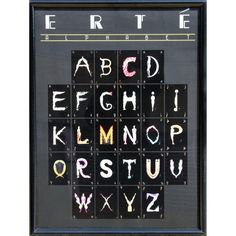 a black frame with letters and numbers written on it