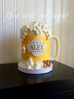 a birthday cake made to look like a beer mug