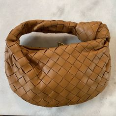 Mini Jodie Bag Only Worn A Few Times! Was A Gift No Receipt Designer Brown Bag With Woven Leather, Designer Brown Pouch Baguette Bag, Designer Brown Baguette Bag In Pouch Shape, Designer Brown Bags In Woven Leather, Intrecciato Weave Pouch Shoulder Bag For Errands, Brown Pouch Baguette Bag With Dust Bag, Luxury Brown Bag With Intrecciato Weave, Luxury Brown Bags With Intrecciato Weave, Designer Handheld Bags With Braided Handles