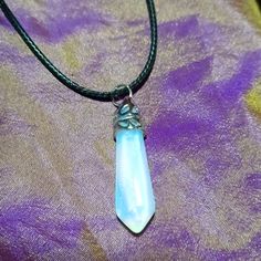 This Is A Gorgeous Opalite Crystal Pendant Necklace. This Is A Handmade Item, And The Pendant Measures Approximately 1 3/8"X 3/8". It Comes With A Black Corded Necklace With An Extension. Opalite Gives Off A Rainbow Of Color Just Like Opal Does, So I Hope You Love This Statement Item As Much As I Do. Thanks For Stopping By And Feel Free To Leave Me A Fair. Adjustable White Gemstone Crystal Necklace, Adjustable White Crystal Gemstone Necklace, White Adjustable Crystal Gemstone Necklace, Adjustable White Crystal Pendant Necklace, White Adjustable Crystal Pendant Necklace, White Adjustable Pendant Crystal Necklace, Iridescent Spiritual Gemstone Crystal Necklace, Opalite Necklace Pendants, Iridescent Labradorite Pendant Necklace