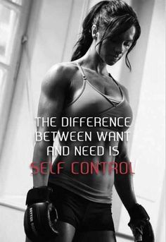 a woman wearing boxing gloves and holding a glove in her right hand with the words self control on it