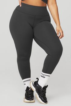 Pilates, pickleball, posting up at home—you’re looking at your new go-to for all of it. Made from our signature Airbrush fabric that’s cottony soft with a smoothing fit, these leggings are thoughtfully designed with a holds-you-in high-rise waistband and full-length legs for a snug fit right down to the hems. Grab your favorite color, and while you’re at it, get a matching bra, too. Alo Yoga Sporty Activewear With Comfort Waistband, Alo Yoga Black Sportswear Activewear, Black Breathable Activewear By Alo Yoga, Womens Onesie, Mirror Pics, Tank Top Bras, Womens Capris, Tank Top Long Sleeve, It Girl