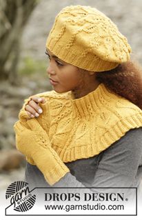 a woman wearing a yellow hat and sweater