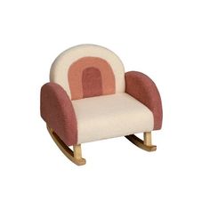 a small wooden rocking chair with pink and white fabric on the back, in front of a white background