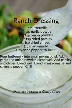 the recipe for ranch dressing is in a jar with a spoon sticking out of it