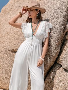 Features: Lace Detail, Smocked Sheer: Opaque Material composition: 100% viscose Care instructions: Machine wash cold. Tumble dry low. Imported Size US Top Length Bust Waist Waist Stretch Amount S 4 57.7 35.4 27.2 31.5 M 6/8 58.3 37 28.7 33.1 L 10/12 59.3 39.4 31.1 35.4 XL 14 60.2 41.7 33.5 37.8 Summer V-neck Jumpsuit For Daywear, Elegant V-neck Jumpsuit For Beach, Chic V-neck Jumpsuits And Rompers With Smocked Back, Bohemian Style Smocked Bodice Summer Jumpsuits And Rompers, Bohemian Jumpsuits And Rompers With Smocked Bodice For Summer, V-neck Jumpsuits And Rompers With Smocked Back For Vacation, Vacation Jumpsuits And Rompers With V-neck And Elastic Waistband, Elegant V-neck Jumpsuits And Rompers For Beach, Bohemian Jumpsuits And Rompers With Smocked Bodice For Vacation