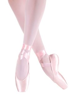 a ballerina's feet in pink ballet shoes