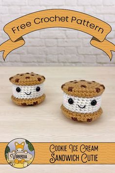 two crocheted cookies are sitting on a table