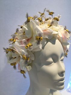 Bee lover- Bee Keeping- Bee Hive- Bee Headband- Bee Keeper- Mad Hatter Party- Tea party- Garden Party- Bee Costume- Kentucky Derby Hello, This Ivory fascinator has 5 rose flowers that are covered with bees and it is about 4 inches wide. It has yellow 1 inch bees buzzing around the flowers. It is attached to a covered skinny headband and is adjustable. It's very comfortable and will fit all ...from 8 to 80! I've been making hair pieces over 20 years. I love what I do and I hope you do too! I ship Queen Bee Costume, Ivory Fascinator, Flower Headdress, Mad Hatter Party, Bee Costume, Hat Party, Mad Hatters, Crazy Hats, Bee Inspired