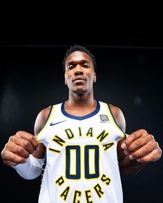 the indiana pacers basketball player is posing for a photo