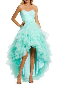 A frothy cascade of tulle ruffles creates dramatic allure on this event-ready strapless dress that's styled with a high-low silhouette. 38" front length; 48 1/2" back length Hidden back-zip closure Sweetheart neck Strapless High-low hem 100% polyester Spot clean Imported Asian Owned/Founded Mac Duggal Prom, High Low Evening Dresses, Vestidos Color Coral, Junior Formal Dresses, High Low Prom Dress, Dama Dresses, High Low Gown, Navy Blue Bridesmaid Dresses, Strapless Evening Dress