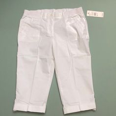 Brand New White Capri Pants Brand New. See Pictures For More Details. Happy To Answer If You Have Any Questions. 97% Cotton 3% Spandex Retail Price Is $44.00 Decent Offers Are Always Welcome White Knee-length Capris For Spring, White Knee-length Spring Capris, Cotton Capris With Pockets, Spring Bermuda Stretch Pants, Stretch Knee-length Bermuda Shorts For Spring, White Knee-length Capris For Summer, Relaxed Fit Cotton Knee-length Capris, Short Solid Cotton Capris, Spring Cotton Bermuda Capris