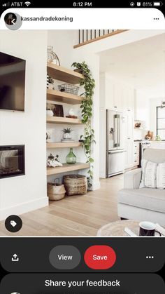 a living room filled with furniture and a flat screen tv