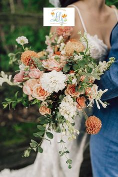 a bride and groom holding a bouquet of flowers