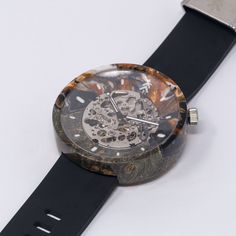 ABOUT A resin and wood masterpiece by our friend Pourcassso aka @DerangedDonkey This is a made to order listing where we will replicate the main characteristics of the pictured watch. LEAD TIME ~6 weeks. DISCLAIMER Each piece is unique and one of a kind. We use similar materials and manufacturing processes but the final product received will have it's own unique characteristics due to the processing nature of resin and wood. Handmade in Canada All of our watches are covered by a Two (2) Year Cra Art Watch, Maple Burl, Epoxy Resin Art, Hand Watch, Beads Bracelet Design, We Watch, Watch Companies, Skeleton Watch, Watch Movement