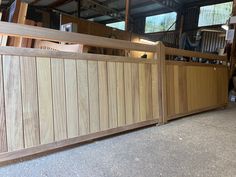 a large wooden gate in the middle of a building