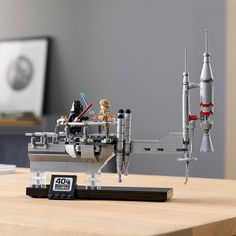 a lego model of a space shuttle on a table