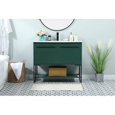 a bathroom with a sink, mirror and green cabinet in front of the bathtub