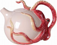 an octopus shaped tea pot with tentacles on it