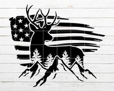 an american flag and deer silhouette on a wooden wall