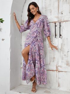 This paisley maxi dress will make you the star of any western wonder! The vibrant print and flowy silhouette will have you feeling free and fearless, while the low V-neckline and quarter sleeves add a touch of elegance. Perfect for a day out in the sun or a night out under the stars. Size Guide: Model is 5’8” tall, and has a 33.4” bust, 26.4” waist, & 35.4” hips. She is wearing a S / US 4 / AU 8. This dress is true to size. Material: 100% Polyester Feature: V-Neckline. Ruffle Bell Sleeves. Swirl Paisley Print. Side Slit. Waist Tie Detail. Wrap dress. Maxi length. Not lined. Relaxed fit. Care Instructions: Machine wash / Cold hand wash Summer Vacation Dresses, Wrap Dress Maxi, Paisley Maxi Dress, Stil Elegant, Split Maxi Dress, Dress Bra, Split Dress, Loungewear Sets, Vacation Dresses