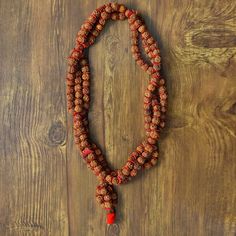 📿This divine 5 Mukhi Rudraksha Kantha Mala helps an individual to get closer to the divine and connects him to the inner Guru (consciousness). The Kanthas hold the divine vibrations of the ruling deity and the positive energy is circulated through each Rudraksha bead which reaches the Sumeru bead and from there it is passed on to the body of the person wearing it.📿 📿Wearing this Rudraksha Kantha Mala removes anomalies of human nature like Kama (Lust), Lobha (Greed), Moha (Attachment), and Kro Traditional 8mm Bead Jewelry For Festivals, Traditional 8mm Beaded Jewelry For Festivals, Bohemian Hand-strung Mala For Rituals, Traditional Necklaces With 8mm Beads For Rituals, Bohemian Adjustable Mala For Puja, Handmade Spiritual Mala For Rituals, Handmade Spiritual Mala For Puja, Bohemian Necklace With 108 Beads For Puja, Bohemian Beaded Necklace With 108 Beads For Puja