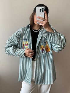 "Vintage The Sheep Orchestra oversized long-sleeve shirt in green, striped, gender neutral, made of 35% cotton and 65% polyester, loose fit, perfect condition  Measurements:  Shoulders 51 cm / 20\" Sleeve 57.5 cm / 22.6\" Length 77.5 cm / 30.5\" Bust from armpit to armpit 57 cm / 22.4\"" Striped Green Shirt Outfit, Green Shirt Outfit, Green Shirt Outfits, Vintage Blouses, Oversized Long Sleeve Shirt, Strip Blouse, The Sheep, Green Shirt, Blouse Vintage