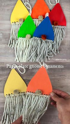 this is an easy and fun craft for kids to make with construction paper, yarn, and glue