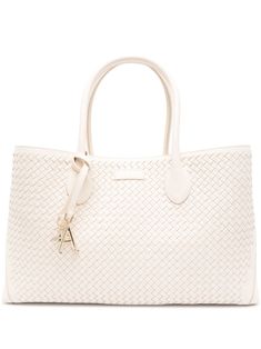 ivory white leather smooth grain interwoven design logo charm signature Bee motif appliqué logo two rolled top handles adjustable detachable shoulder strap magnetic strap fastening partitioned compartment internal zip-fastening pocket White Shoulder Bag With Braided Double Handles, White Satchel With Double Leather Handles, White Satchel With Braided Handles For Travel, White Satchel With Braided Handles For Everyday Use, White Top Handle Satchel With Braided Handles, White Satchel With Double Handle And Handle Drop, Modern White Shoulder Bag With Braided Handles, White Double Handle Satchel With Handle Drop, Woven Leather Tote