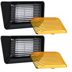 two black and yellow lights are shown side by side