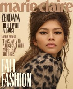 a woman with long hair wearing a leopard print coat on the cover of an magazine