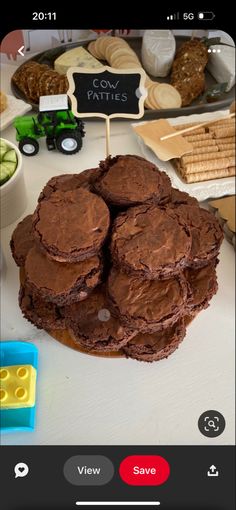 a table topped with lots of chocolate cakes